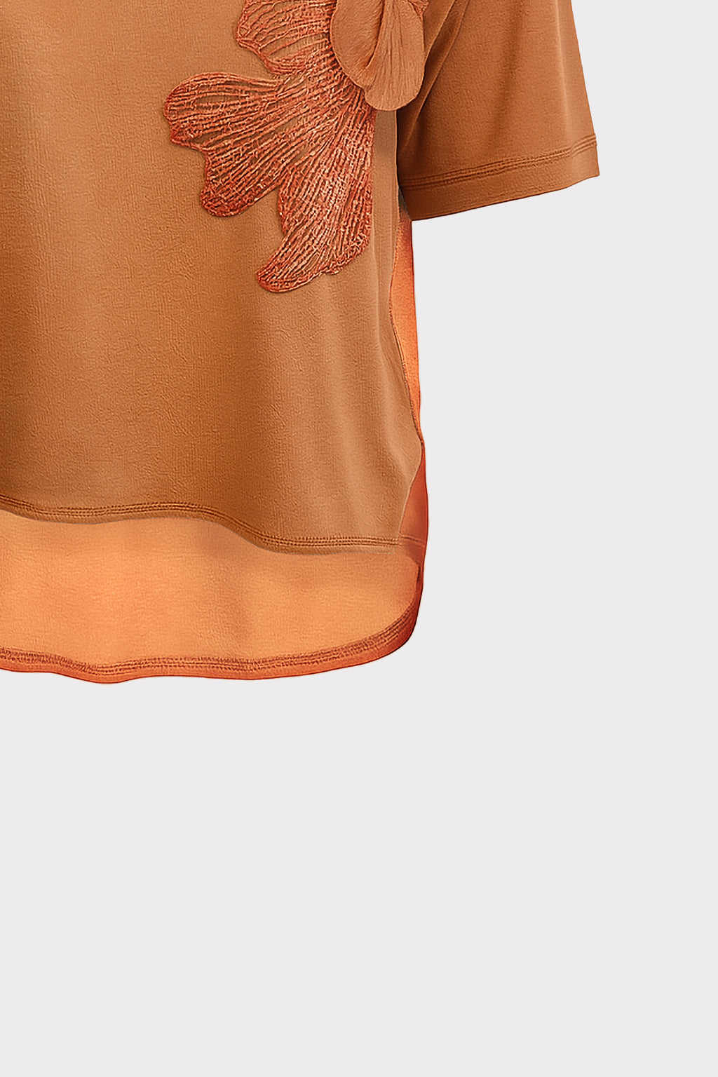 Blusa dettaglio fiore e perle